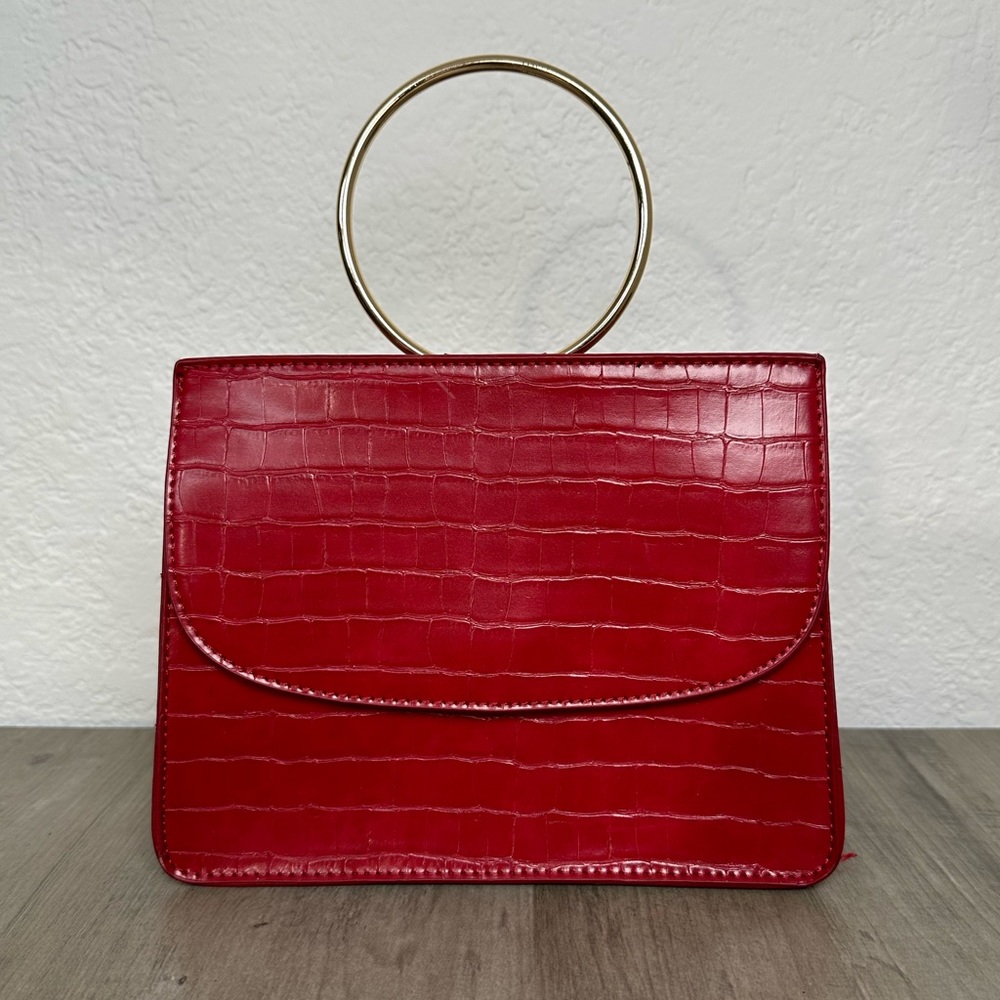 Little Red Bag with a Gold Ring Handle